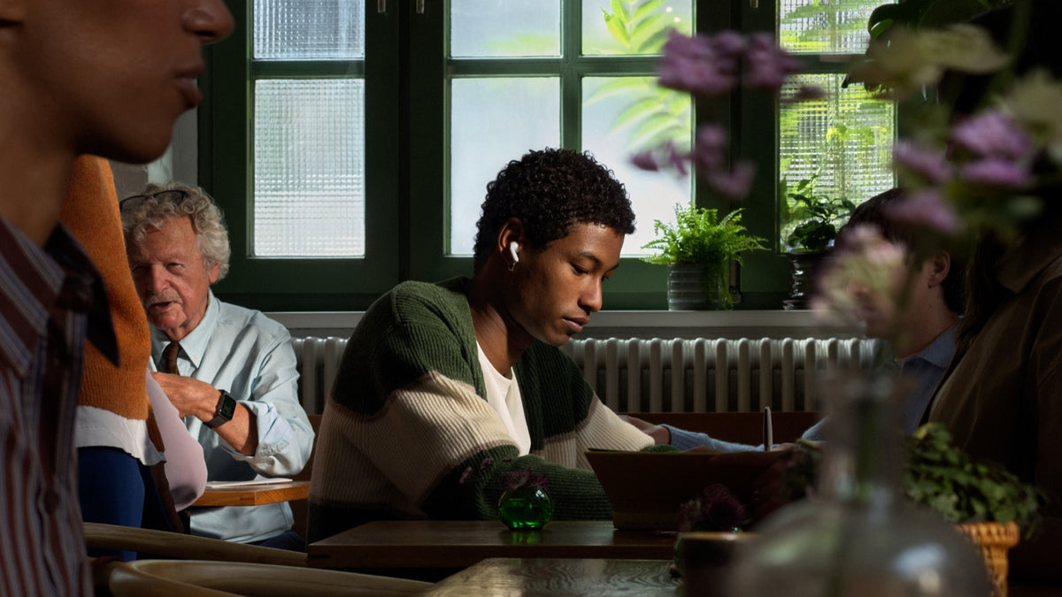 Apple AirPods 5 being worn